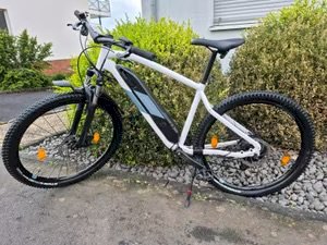 Ebike Rockrider Hardtail 27,5 Neuwertig, Weiss/Blau  - Gratisinserat.ch